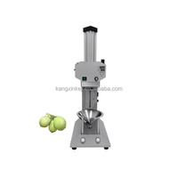 Machine automatique de pelage et d'extraction d'eau de coco de la meilleure qualité