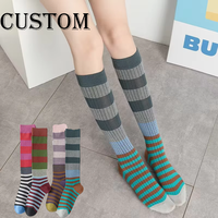 Chaussettes à la mode polyvalentes de sport décontractées pour femmes Chaussettes longues à rayures Chaussettes en coton printemps automne