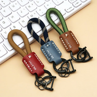 Porte-clés de voiture en cuir véritable fait main, cordon tressé, pendentif personnalisable avec logo, lanière anti-perte