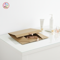 Emballage personnalisé pour vêtements avec boîte à ruban