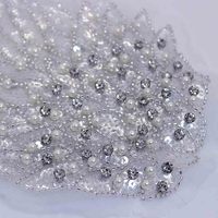 Vente en gros de perles brodées de qualité supérieure strass patch PVC perlé dentelle appliques chemises à paillettes décorées coeur fleur dentelle à coudre