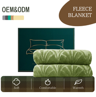 Couverture en flanelle ultra douce et soyeuse avec motif de feuilles en relief, personnalisable OEM ODM, quatre saisons, 100% polyester, chaleur somptueuse pour canapé, lit, sofa