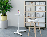 Table d'appoint ergonomique moderne OMNI pour ordinateur portable, bureau réglable à poser sur le lit avec roulettes et support mural pliable, design peu encombrant