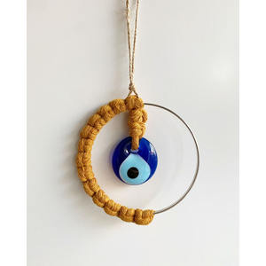 Handgewebte Baumwollfaden-Kunst: Blaues Glas-Augen-Hängedekoration mit Metallring für Diwali - Product Image 2