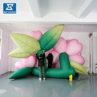 Modèle de fleur gonflable géante rose personnalisée pour la décoration de sites touristiques extérieurs, de scènes, de marchés et de festivals