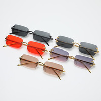 UNOC 2023 Lunettes de soleil à monture dorée Lunettes de soleil rectangulaires de luxe en métal étroit sans monture en acrylique Nouvelle mode pour femmes et hommes