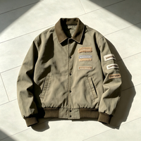 Veste de travail en toile de coton lavée pour homme OEM, avec plusieurs patchs en chenille, col en velours côtelé, style streetwear, veste bomber décontractée pour homme