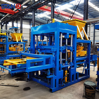 Machine automatique hydraulique QT4-15 pour la fabrication de briques creuses en béton, de pavés et de briques de sol emboîtables