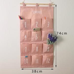 <b>TV</b> <b>Remote</b> <b>Control</b> Hanging Holder Household Fabric Pocket Wall Organizer Used to Hang Clutter - Product Image 1