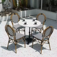 Ensemble de chaises de salle à manger rétro de style français moderne en rotin tissé pour balcons, magasins de thé au lait, séjours chez l'habitant, cuisine en métal, cour