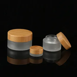 Pot en verre de baume cosmétique de logo de couleur personnalisée de grande taille écologique de 100g pot de crème cosmétique givré avec couvercle en bambou