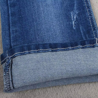 Tela Vaquera de Alta Elasticidad de 10 oz con Textura, Color Azul Oscuro, Buena Calidad, de un Fabricante y Proveedor de Guangdong, China
