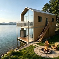 Villa préfabriquée moderne, maison modulaire portable, structure en acier avec balcon et portes en verre