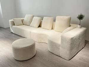 Sofá Modular Curvo y Extendido, Tapizado en Lana de Cordero Texturizada, Color Blanco Crema, con Taburete a Juego, Suave y Acolchado, para Escuela o Parque - Product Image 1