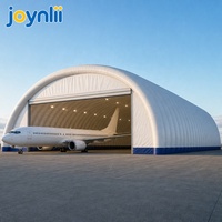 Grand hangar gonflable résistant aux intempéries, abri à colonnes d'air pour le stationnement, la réparation et l'entretien des avions