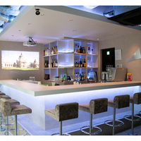 Comptoir de bar de restaurant en surface solide blanche, design minimaliste en forme de L, pour centre commercial, club, hôtel, avec garantie de 10 ans