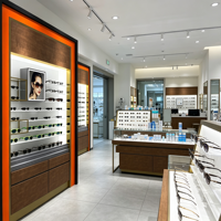 Vitrine optique de luxe sur mesure avec éclairage LED, présentoir à lunettes professionnel pour magasin d'optique, intérieur de magasin en acrylique