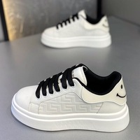 Chaussures basses de skate de luxe pour hommes, modèle OEM d'usine, avec empeigne bicolore noir et blanc, semelle épaisse polyvalente