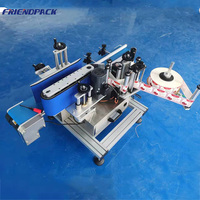Etiqueteuse de bouteilles liquides rondes de table Petite étiqueteuse automatique pour bocaux
