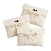 Sac en coton pour emballage de chaussures, impression de logo personnalisée, fermeture à rabat naturel, attache en ruban, vente en gros, approvisionnement en vrac, réutilisable