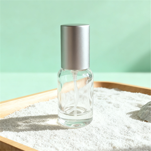 Flacon de parfum cylindrique transparent vide de 10 ml, format voyage mini, capacité 30 ml, <span class=keywords><strong>avec</strong></span> pulvérisateur à pompe, sérigraphié - Product Image 1