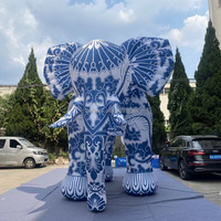 Modèle d'animal gonflable géant réaliste et accrocheur, éléphant gonflable de style traditionnel chinois avec motif floral pour les événements