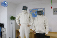 Combinaison de sécurité Junda en toile de voile renforcée d'acier blanc de qualité supérieure, résistante aux éclaboussures, avec casque intégré pour environnements difficiles