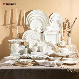 Juego de vajilla de porcelana blanca con diseño de loto, vajilla de cerámica en relieve, venta al por mayor personalizada para hoteles, restaurantes y bodas - Product Image 1