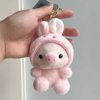 Lindo cerdo de dibujos animados mochila colgante llavero de felpa suave exquisita tienda agarrar máquina cerdo almacenamiento llavero
