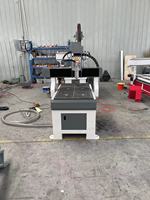 Router CNC 6090 dengan poros sekrup meja vakum poros berpendingin air mesin pemotong ukiran kayu akrilik presisi tinggi