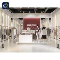 Vitrine de présentation en verre robuste en matériaux recyclés pour magasin de vêtements de créateurs