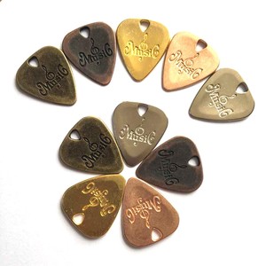 Accessorio per chitarra professionale plettri per chitarra in metallo scelte per <span class=keywords><strong>basso</strong></span> <span class=keywords><strong>elettrico</strong></span> da 0.75mm 1.95mm scelte per chitarra personalizzate prezzo all'ingrosso - Product Image 1
