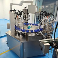 Nouvelle conception de machine de remplissage de parfum en forme de tourne-disque, remplisseur de liquide parfumé avec station de pressage et de sertissage
