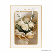 Sac cadeau en papier premium avec fenêtre de présentation en PVC, poignées en corde et bordure dorée pour les besoins d'emballage de boutiques florales et de cadeaux
