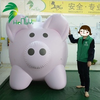 Pig gonflable personnalisé en PVC/tissu Oxford avec ventilateur intégré et décorations monétaires pour événements publicitaires