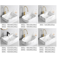 Lavabo de comptoir en céramique avec 5 ans de garantie et poignée unique pour les projets de toilettes d'hôtel et de villa