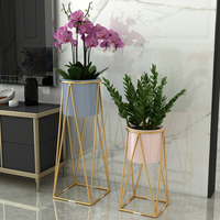 Nouveaux pots de fleurs et jardinières en métal doré pour plantes d'intérieur, grands et volumineux, vente en gros, à prix abordable, avec support