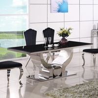 Ensemble de table de salle à manger avec 6 chaises Ensemble de table à manger avec dessus en verre transparent Mobilier de maison de luxe en acier inoxydable Verre trempé moderne