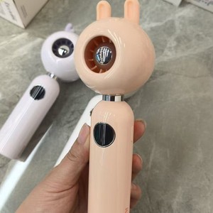 พัดลมพกพาขนาดเล็กพร้อมจอแสดงผลดิจิตอลไร้ใบพัด USB ชาร์จได้ พัดลมระบายความร้อนแบบมือถือพลังสูงสำหรับใช้งานกลางแจ้ง สีส้ม ลายแมว สีชมพู - Product Image 4