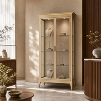 Vitrine en verre dorée sur mesure avec 2 portes, étagères en verre et éclairage LED pour bijouterie, vente en gros