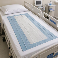 Protège-matelas jetable 5 plis en pâte fluff pour le transfert et la repositionnement des patients