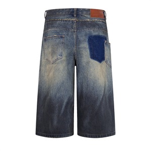 Shorts en jean épais pour <span class=keywords><strong>homme</strong></span> avec déchirures irrégulières, bords bruts, design œil de chat et patchs délavés à la pierre - Product Image 4