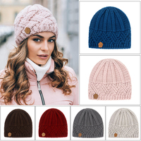 Vente en gros de bonnets rétro en acrylique pour femmes en hiver chapeau en crochet tricoté en grosses côtes avec motif de crâne chaud et élégant