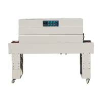 Een elektrisch afgesloten automatische krimpfoliemachine voor eieren- en fruitverpakkingen, met aluminiumfolie/filmverpakking, food grade.