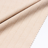 Tissu tricoté en polyester et élasthanne cationique DTY Dralon 100 % polyester pour l'hiver, brossé sur deux côtés, personnalisable pour vêtements