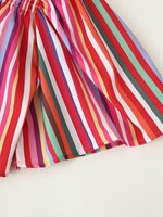 Ensemble femme 2026 : Nouvelle chemise décontractée à rayures imprimées et jupe midi rétro rayée pour femme