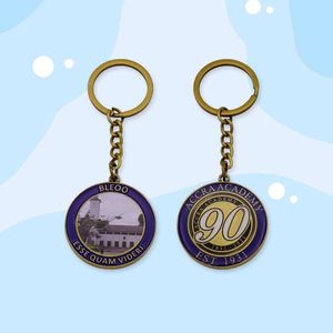 พวงกุญแจโลหะแบบกำหนดเอง ผลิตด้วยวิธีหล่อขึ้นรูป พร้อมที่ใส่โลโก้ทรงกลม ตัวเลือกการพิมพ์แบบออฟเซ็ตและยูวี - Product Image 1