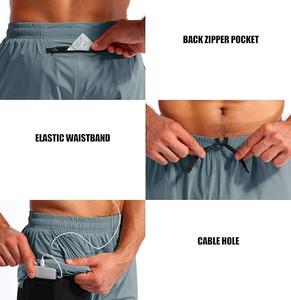 กางเกงขาสั้นออกกำลังกายผู้ชาย แห้งเร็ว กันน้ำ เอวยางยืด เหมาะสำหรับฟิตเนส วิ่ง ยิม ผลิตจากโพลีเอสเตอร์และผ้าฝ้าย - Product Image 5
