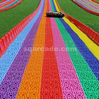 Produits de parc d'attractions commerciaux prairie artificielle ski herbe ski voiture arc-en-ciel toboggan pente longue glissade sur piste