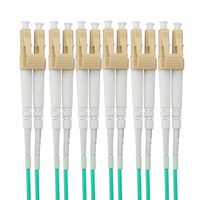 Tali Kekang Tambalan Serat Optik 1M MPO MTP Pria Wanita Ke LC UPC 12C 12 Core OM3 OM4 Mode Tunggal SM PVC LSZH 0.9Mm 2.0Mm 3.0Mm